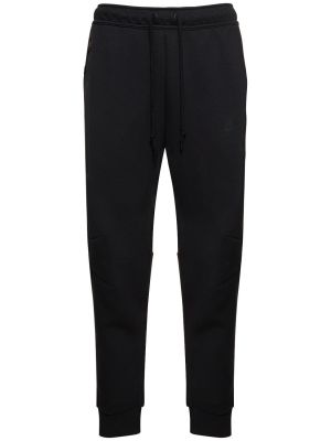 Slim fit fleecové sportovní kalhoty Nike černé
