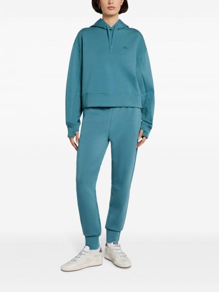 Pantalon de joggings avec applique Lacoste bleu
