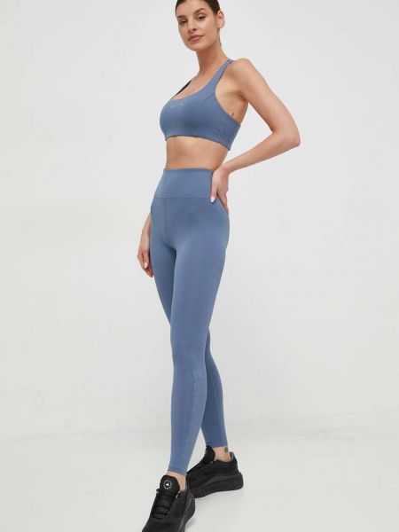 Spodnie sportowe z nadrukiem Calvin Klein Performance niebieskie
