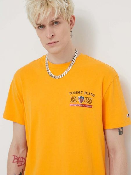 Koszulka bawełniana z nadrukiem Tommy Jeans żółta
