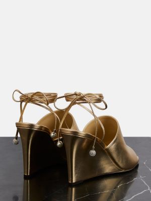 Kožené sandály na klínovém podpatku Jimmy Choo zlaté
