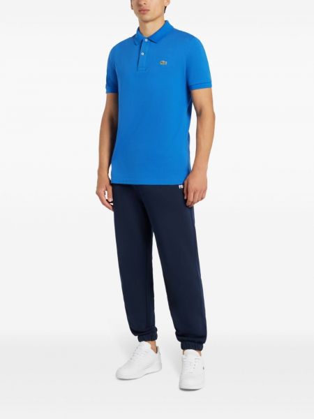 Medvilninis siuvinėtas polo marškinėliai Lacoste mėlyna