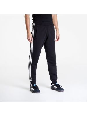 Slim fit pruhované sportovní kalhoty Adidas Originals černé