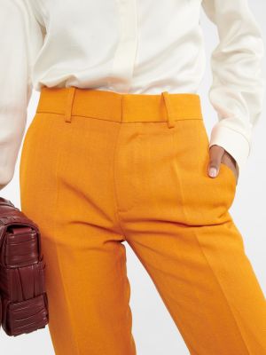 Ravne hlače z nizkim pasom Petar Petrov oranžna