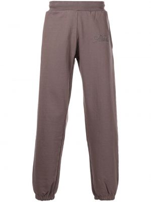 Teplákové nohavice s výšivkou Market fialová