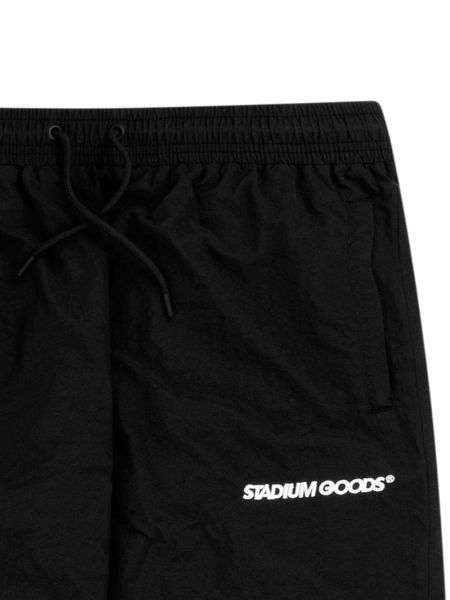 Sportovní kalhoty s potiskem Stadium Goods černé