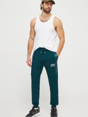 Spodnie sportowe Guess zielone
