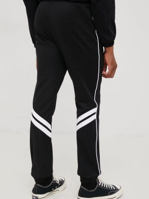 Sportovní kalhoty s aplikacemi Fila černé