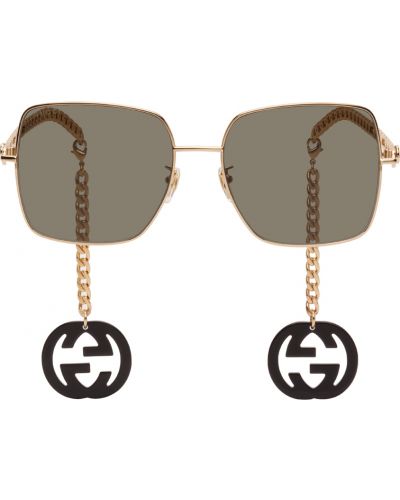 Солнцезащитные очки на цепочке Gucci