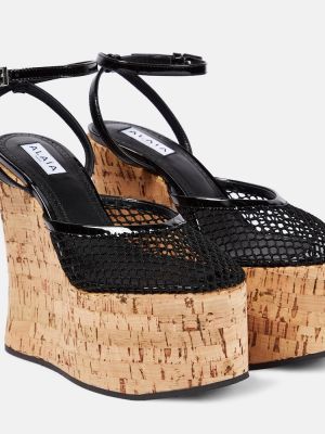 Lakierowane sandały skórzane na koturnie Alaã¯a czarne