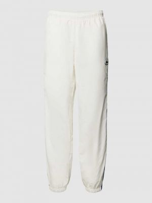 Spodnie sportowe Lacoste białe