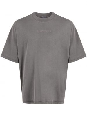 Bombažna majica s potiskom Lacoste siva