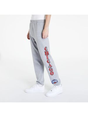 Fleecové sportovní kalhoty Mitchell & Ness šedé