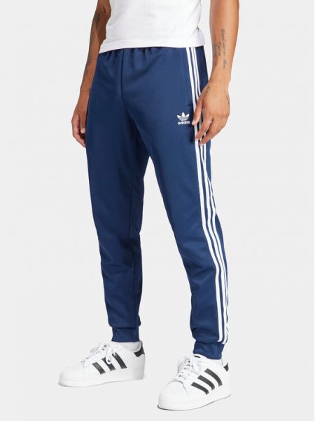 Slim fit priliehavé teplákové nohavice Adidas