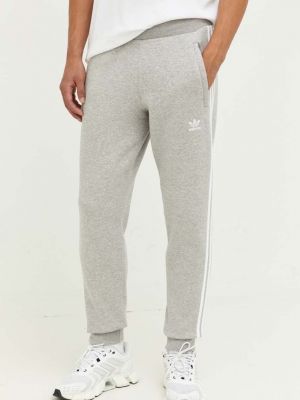 Панталон на райета с апликация Adidas Originals сиво