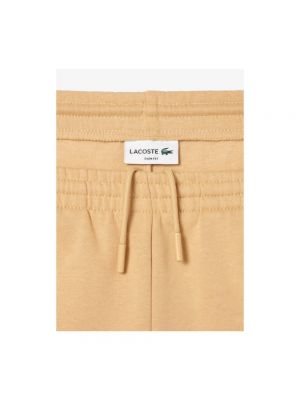 Pantalones de chándal slim fit de algodón Lacoste beige