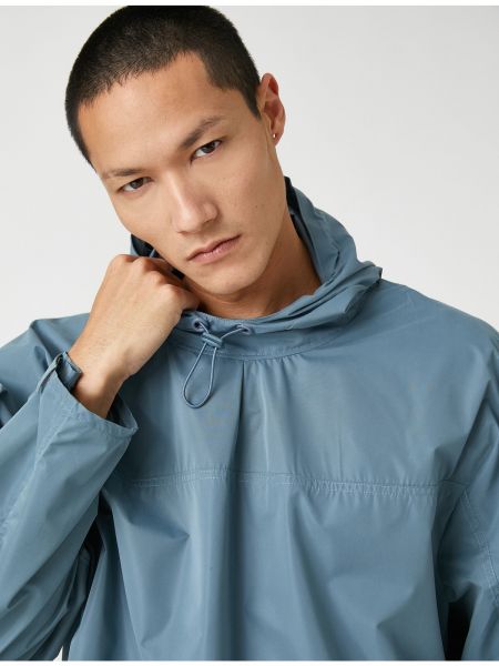 Vodoodporni plašč s kapuco z dolgimi rokavi Koton modra