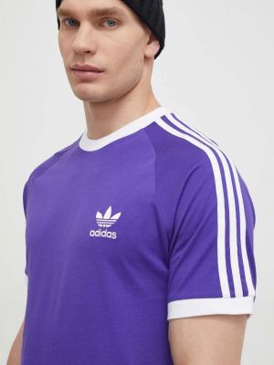 Памучна тениска с дълъг ръкав на райета с апликация Adidas Originals виолетово