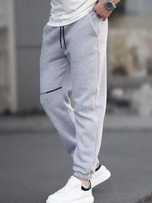 Sportovní kalhoty s kapsami Madmext šedé