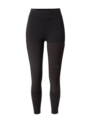 Jednofarebné teplákové nohavice s vysokým pásom skinny fit The North Face - čierna Jednofarebné teplákové nohavice s vysokým pásom skinny fit The North Face - čierna