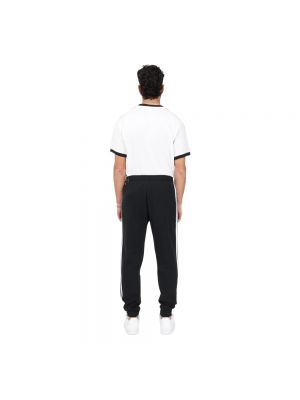 Pantalones de chándal a rayas Adidas Originals negro