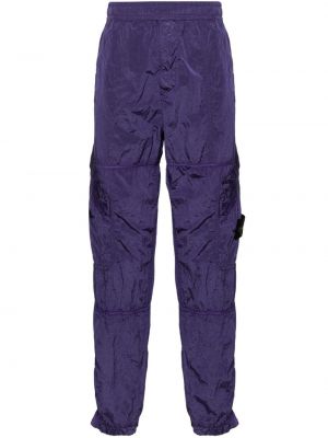 Teplákové nohavice Stone Island fialová