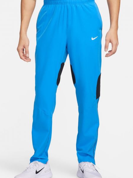 Теннисные брюки Nike синие