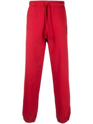 Bavlněné sportovní kalhoty s výšivkou Paccbet červené