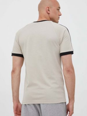 Bavlněné tričko s aplikacemi Adidas Originals béžové