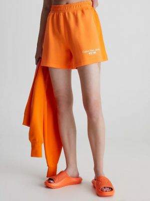 Farmer rövidnadrág Calvin Klein Jeans narancsszínű