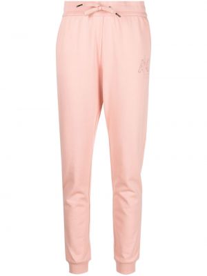 Spodnie sportowe bawełniane Armani Exchange różowe