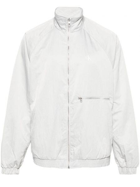 Traper jakna s printom Calvin Klein Jeans siva