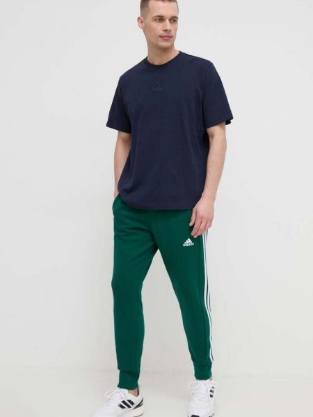 Spodnie sportowe bawełniane w paski Adidas zielone