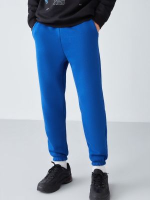 Teplákové nohavice Grimelange modrá