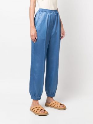 Saténové sportovní kalhoty Nanushka modré
