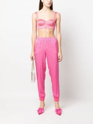 Spodnie sportowe z nadrukiem Moschino różowe