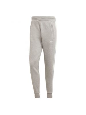 Pantalon de joggings ajusté à rayures Adidas gris
