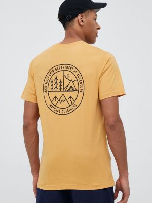 Bavlněné tričko s potiskem Jack Wolfskin žluté