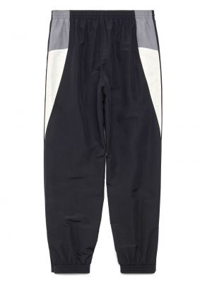 Sportovní kalhoty s potiskem Balenciaga černé