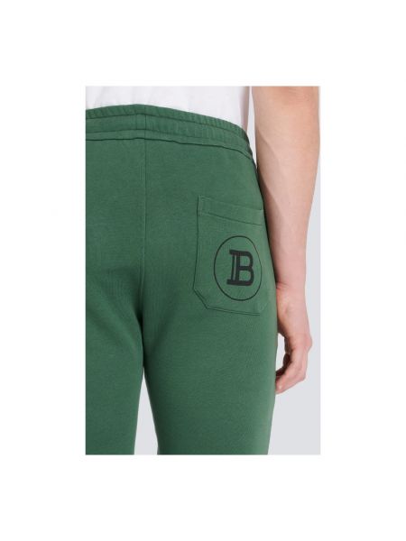 Spodnie sportowe z nadrukiem Balmain zielone