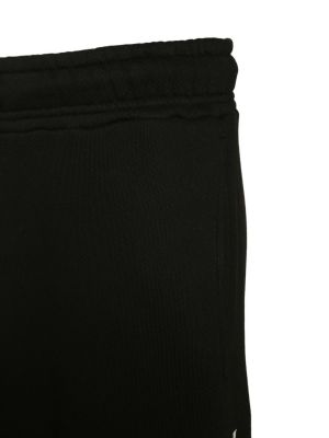 Spodnie sportowe bawełniane z nadrukiem Palm Angels czarne