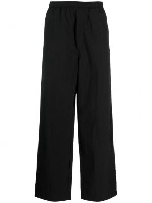 Rovné kalhoty z nylonu Acne Studios černé