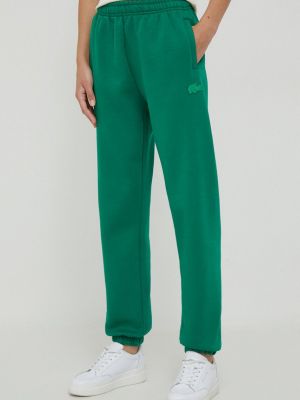 Зеленые однотонные спортивные штаны Lacoste