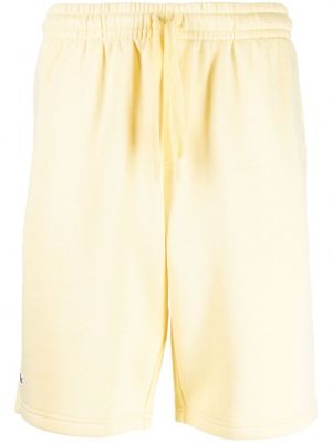 Хлопковые шорты с вышивкой Lacoste, желтые