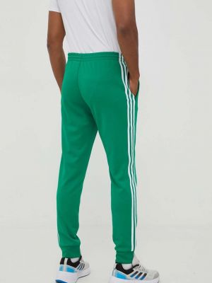 Sport nadrág Adidas Originals zöld