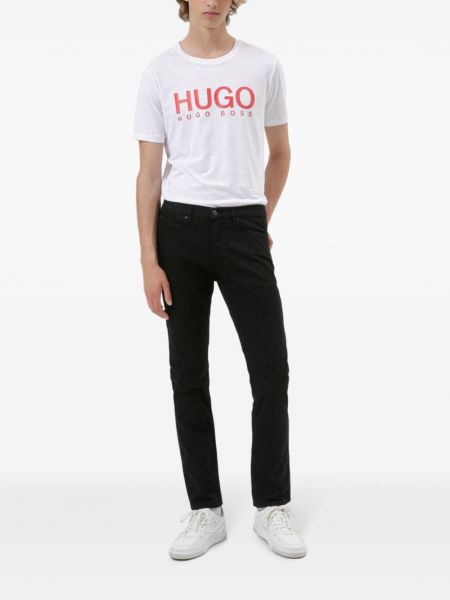 Medvilninės skinny fit džinsai slim fit Hugo juoda