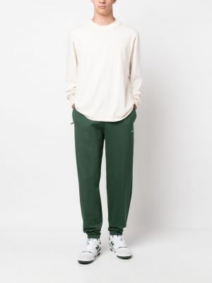Haftowane spodnie sportowe Nike zielone