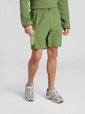 Teplákové nohavice Columbia zelená