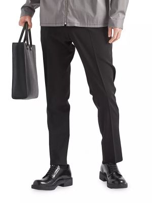 Шерстяные брюки Prada черные
