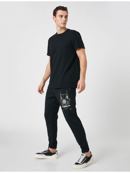 Šněrovací sportovní kalhoty s potiskem s kapsami Koton černé